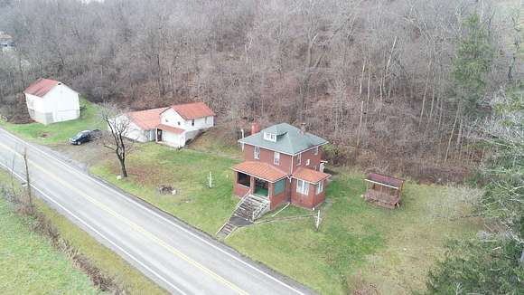 24.5 Acres of Land with Home for Auction in Waynesburg, Pennsylvania