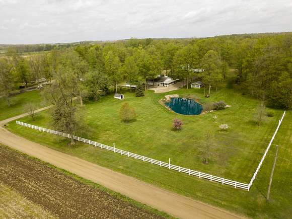 25 Acres of Recreational Land with Home for Auction in Reading, Michigan