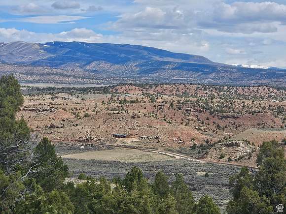 80 Acres of Agricultural Land with Home for Sale in Fruitland, Utah