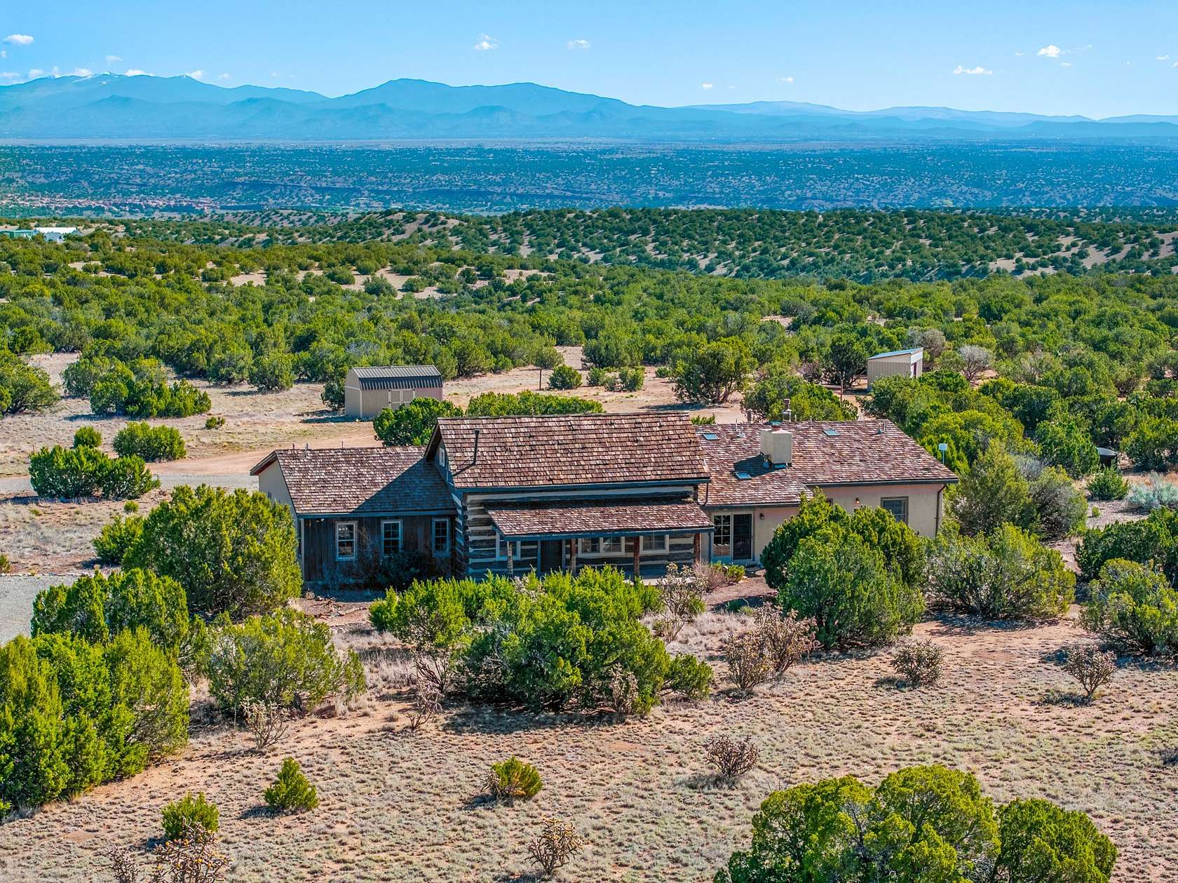 80 Acres of Land with Home for Sale in Cerrillos, New Mexico