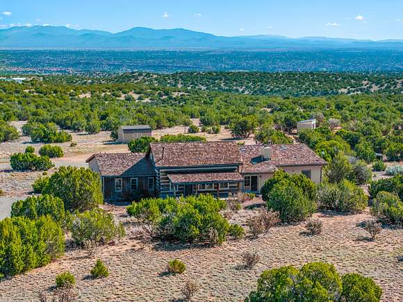 80 Acres of Land with Home for Sale in Cerrillos, New Mexico
