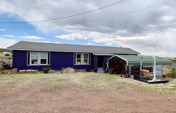 2.5 Acres of Residential Land with Home for Sale in Show Low, Arizona