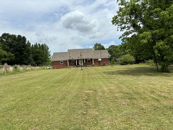 55.4 Acres of Land with Home for Sale in Blue Mountain, Mississippi