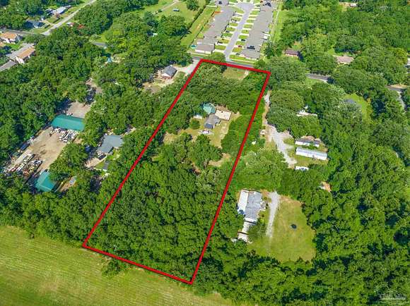 2.886 Acres of Residential Land with Home for Sale in Pensacola, Florida