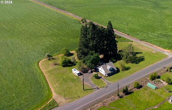 127 Acres of Agricultural Land with Home for Sale in Junction City, Oregon