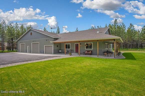 5.7 Acres of Residential Land with Home for Sale in Rathdrum, Idaho
