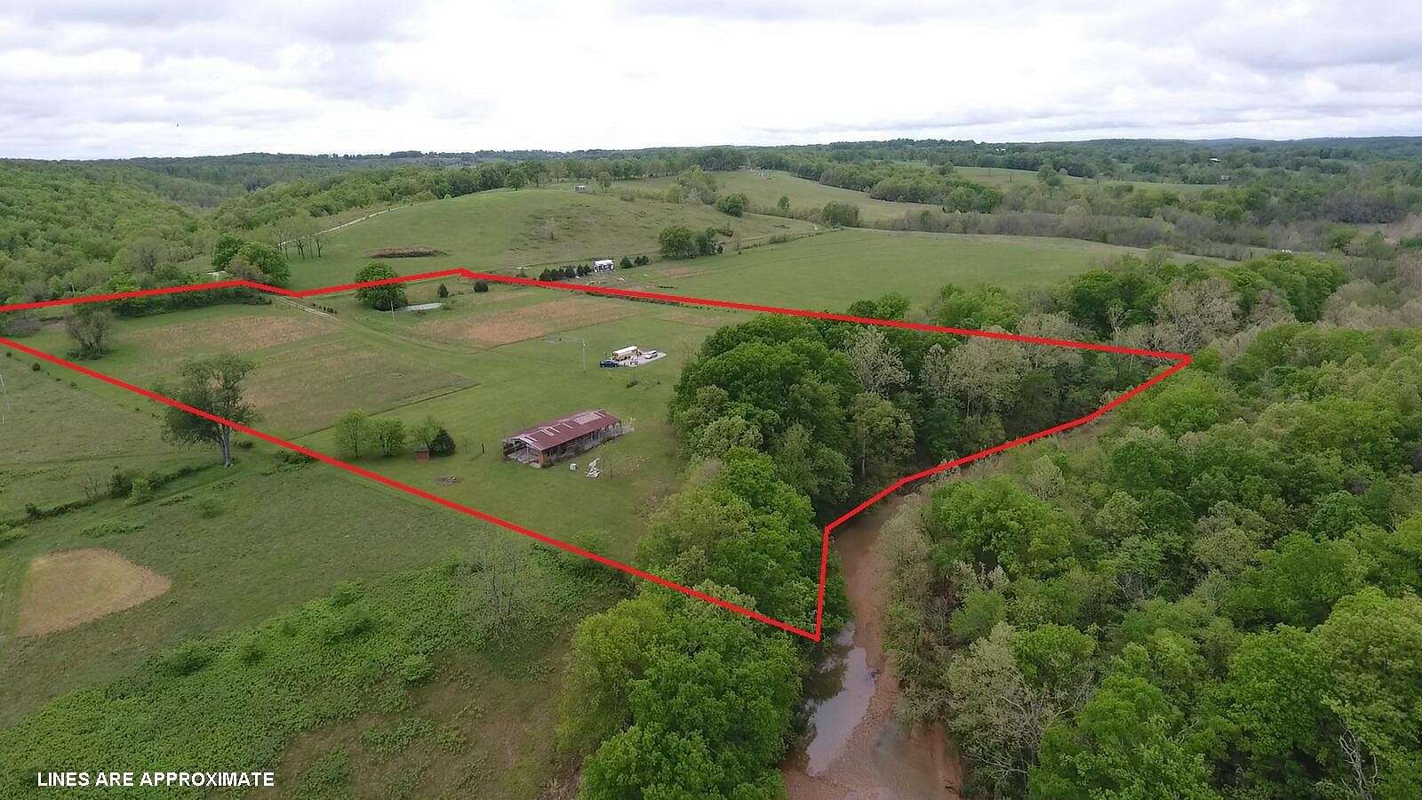 11.77 Acres of Land with Home for Sale in Willow Springs, Missouri