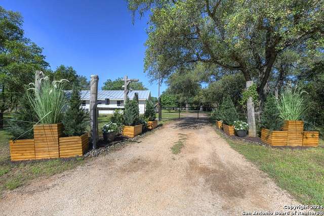 5.7 Acres of Residential Land with Home for Sale in New Braunfels, Texas