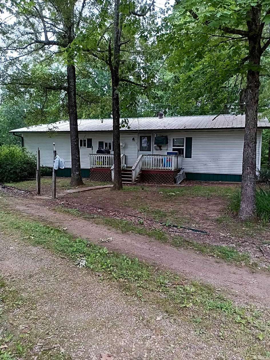 10 Acres of Land with Home for Sale in Hardy, Arkansas