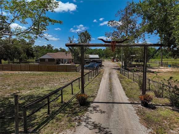 39.8 Acres of Land with Home for Sale in Myakka City, Florida