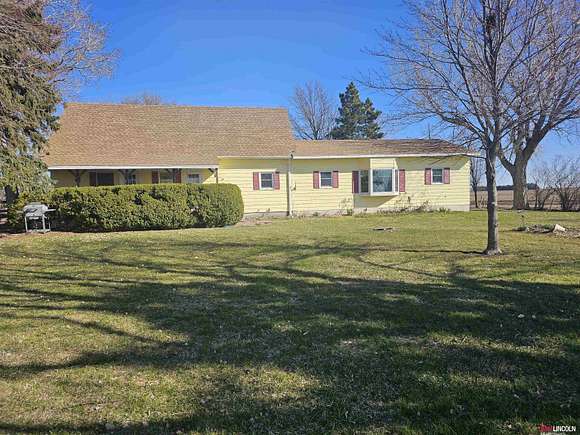 Land with Home for Sale in Sutton, Nebraska