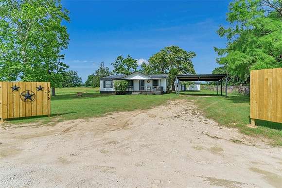 5 Acres of Land with Home for Sale in Granbury, Texas