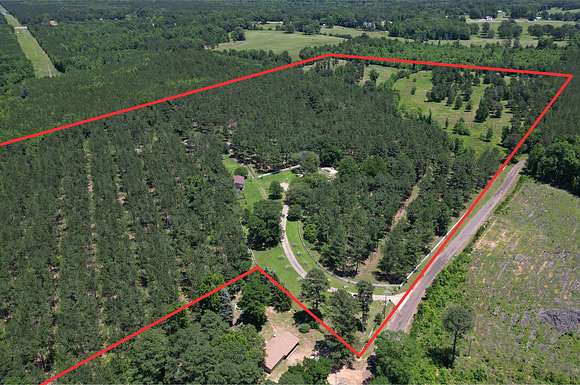 48.2 Acres of Land with Home for Sale in Atlanta, Texas