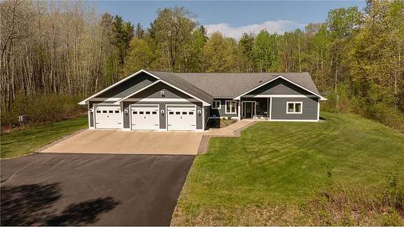 5 Acres of Residential Land with Home for Sale in Nisswa, Minnesota