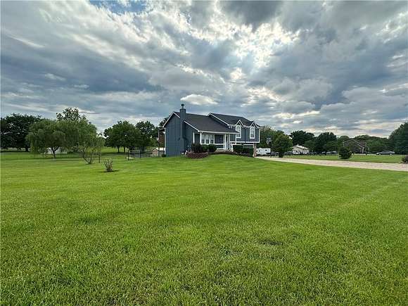 5 Acres of Residential Land with Home for Sale in Garden City, Missouri