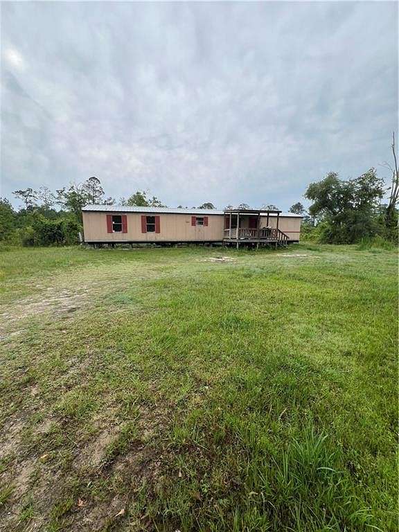 5.8 Acres of Land with Home for Sale in Nahunta, Georgia
