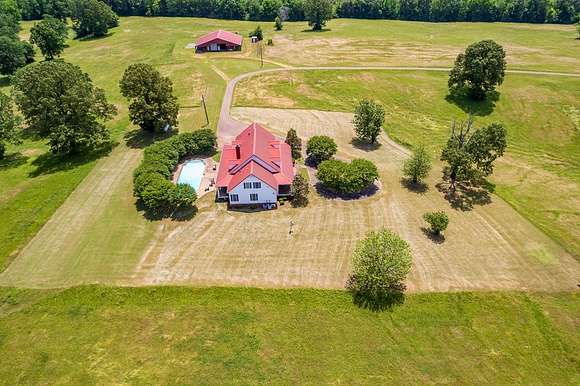 80 Acres of Land with Home for Sale in Sardis, Mississippi