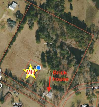 9.3 Acres of Residential Land with Home for Sale in Pittsburg, Texas