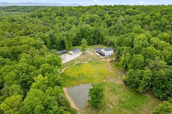 16.8 Acres of Land with Home for Sale in Deer Lodge, Tennessee