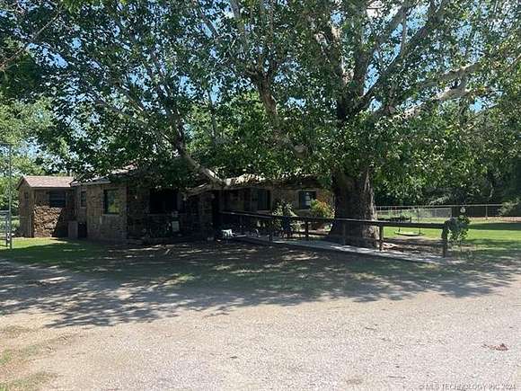 20.1 Acres of Agricultural Land with Home for Sale in Panama, Oklahoma