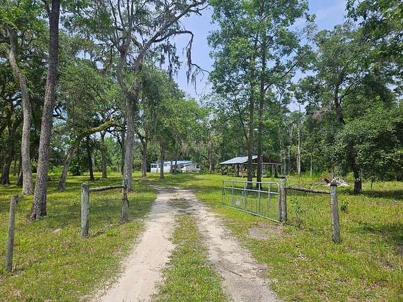 5 Acres of Residential Land with Home for Sale in Old Town, Florida