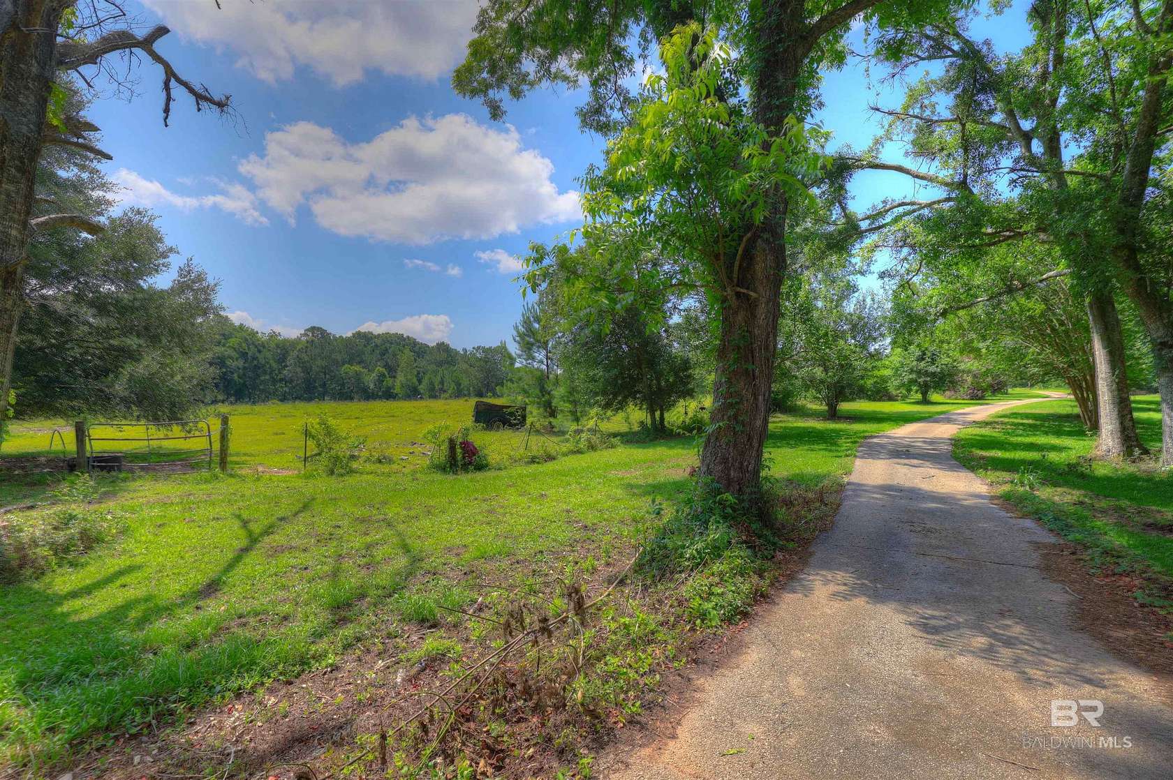 58 Acres of Agricultural Land with Home for Sale in Fairhope, Alabama
