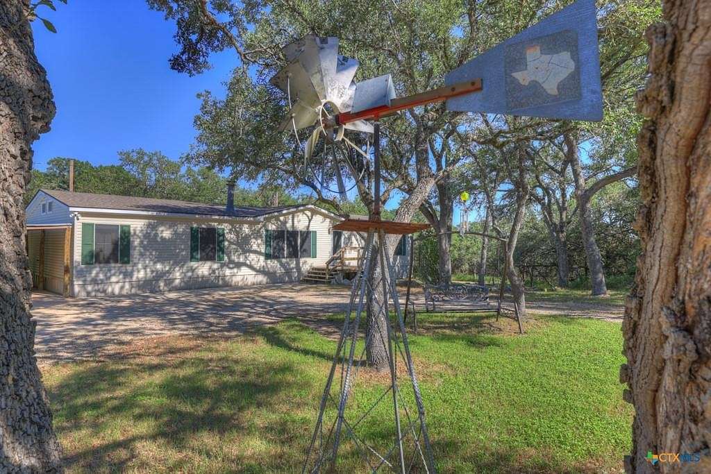 6.1 Acres of Residential Land with Home for Sale in Canyon Lake, Texas