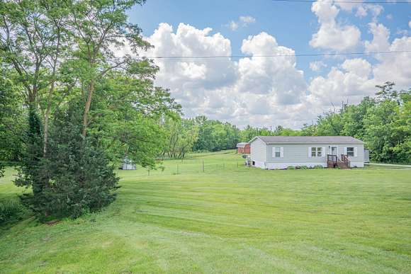 2.3 Acres of Residential Land with Home for Sale in Huntsville, Missouri