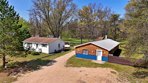 5 Acres of Residential Land with Home for Sale in Irons, Michigan