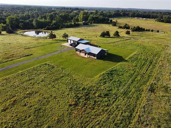 12 Acres of Land with Home for Sale in Quitman, Texas