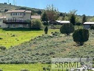 4.9 Acres of Residential Land with Home for Sale in Pocatello, Idaho