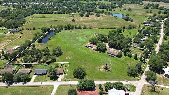 11.8 Acres of Improved Mixed-Use Land for Sale in Madisonville, Texas