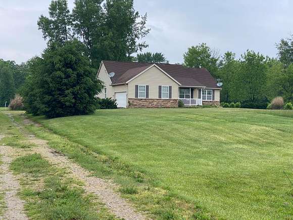 8.3 Acres of Residential Land with Home for Sale in West Jefferson, Ohio
