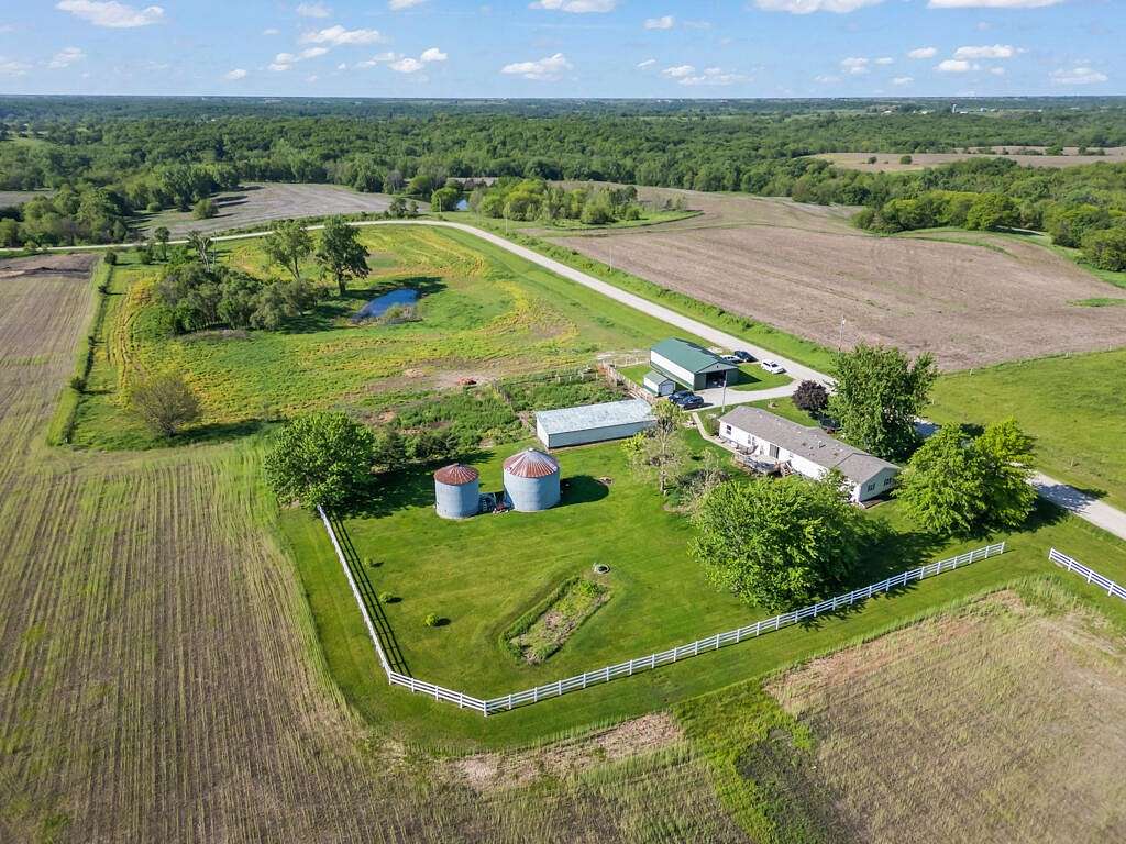 9 Acres of Residential Land with Home for Sale in Osceola, Iowa