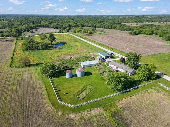 9 Acres of Residential Land with Home for Sale in Osceola, Iowa