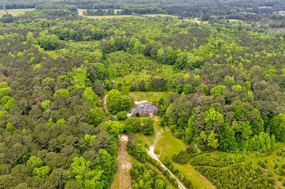 75.7 Acres of Land with Home for Sale in Brooks, Georgia