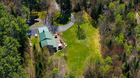 6.1 Acres of Residential Land with Home for Sale in Whitefield, New Hampshire