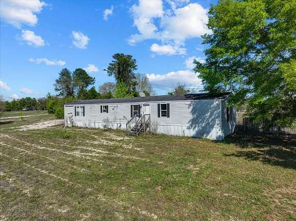 5 Acres of Residential Land with Home for Sale in Trenton, Florida