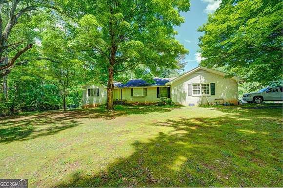 15.3 Acres of Land with Home for Sale in Covington, Georgia