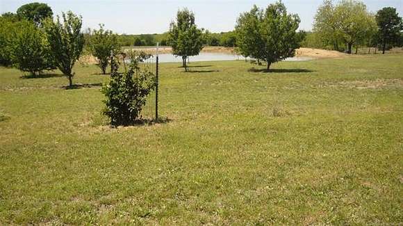 5.8 Acres of Residential Land with Home for Sale in Madill, Oklahoma