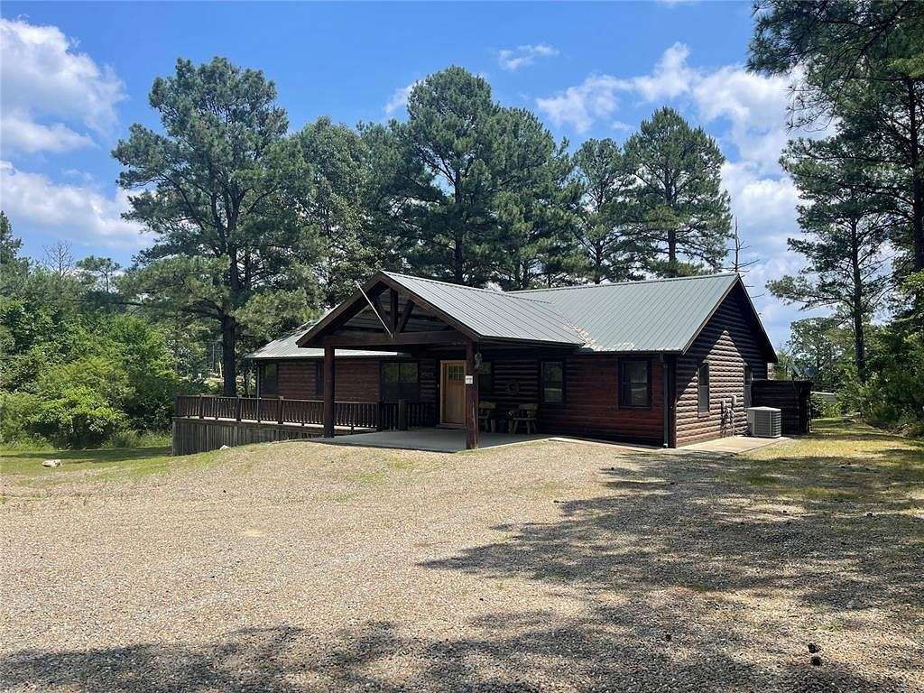 0.91 Acres of Residential Land with Home for Sale in Broken Bow, Oklahoma