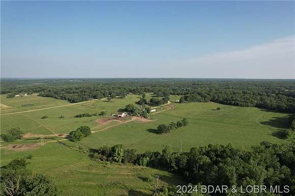 96 Acres of Agricultural Land with Home for Sale in Cole Camp, Missouri