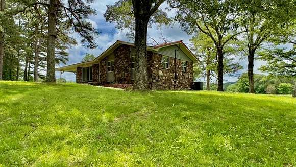 10.86 Acres of Land with Home for Sale in Melbourne, Arkansas