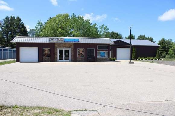 2.5 Acres of Improved Commercial Land for Sale in Harrison, Michigan