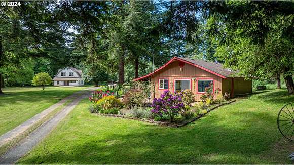 6.68 Acres of Residential Land with Home for Sale in North Bend, Oregon