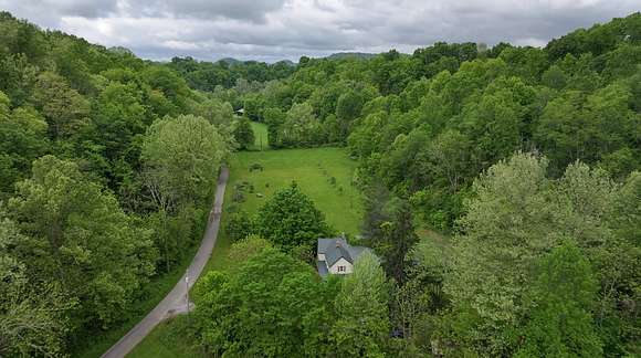 75 Acres of Land with Home for Auction in Gravel Switch, Kentucky