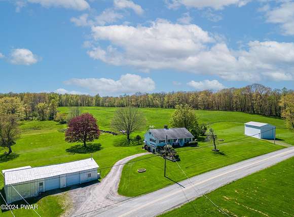 14.8 Acres of Land with Home for Sale in Clifford Township, Pennsylvania