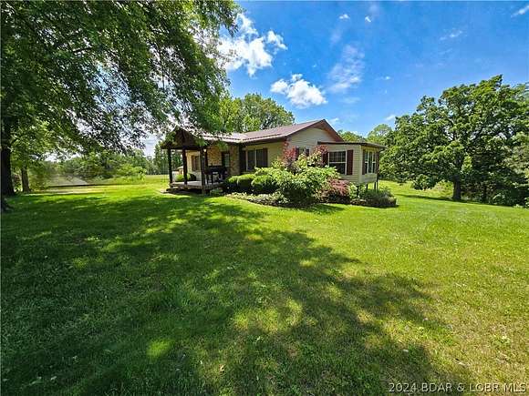 4.9 Acres of Residential Land with Home for Sale in Versailles, Missouri