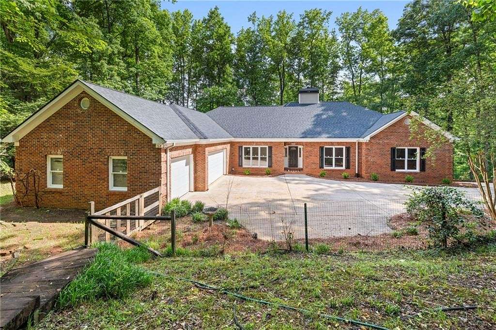 8.01 Acres of Residential Land with Home for Sale in Cumming, Georgia