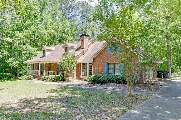 2.1 Acres of Residential Land with Home for Sale in Sugar Hill, Georgia